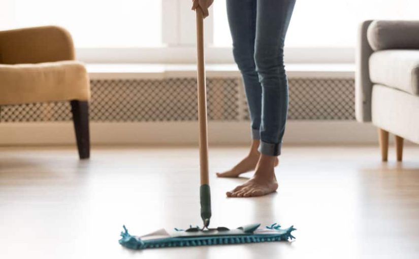 cleaner mopping the floor