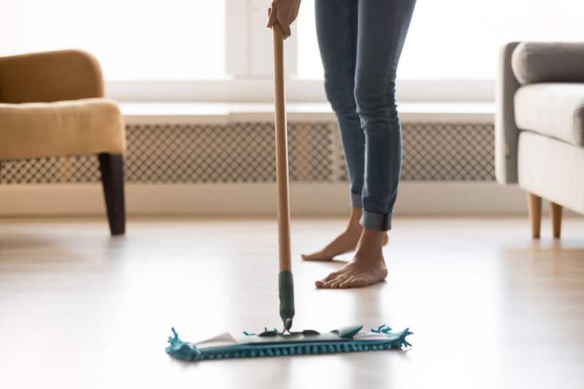 cleaner mopping the floor